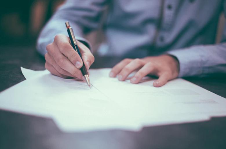 Guy writing