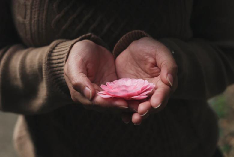 Holding a flower