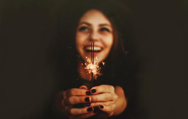 Smiling girl with sparkles