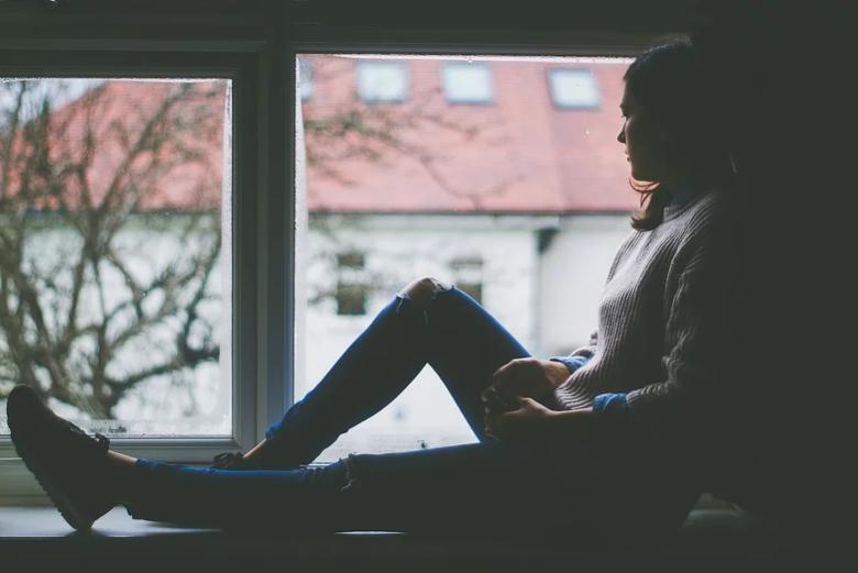 Woman sitting alone